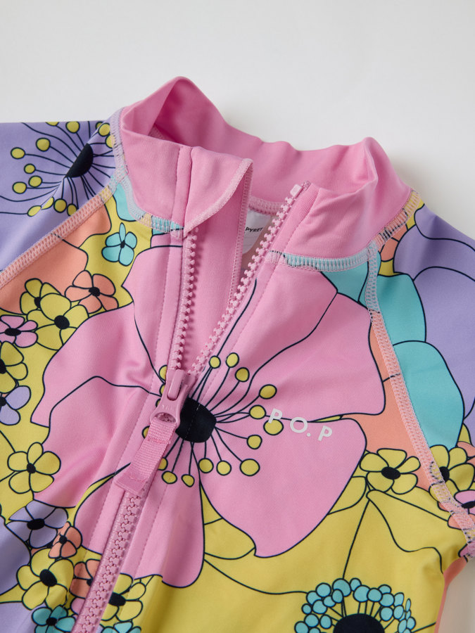 Kortärmad UV-dräkt blommig Kortärmad UV-dräkt blommig