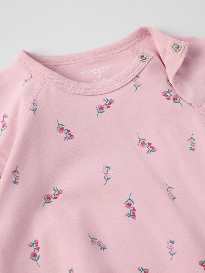 Förlängningsbar body blommig Förlängningsbar body blommig